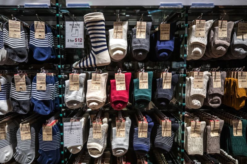 TRIBUNE PHOTO: JONATHAN HOUSE - Socks in a range of colors and styles complement sneakers and shoes sold at the store