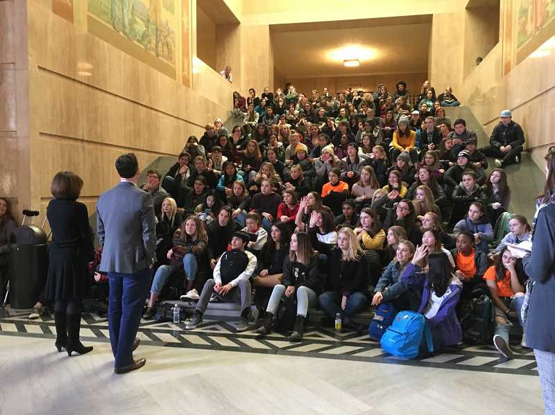 REVIEW PHOTO: CLAIRE HOLLEY - State Rep. Andrea Salinas and state Sen. Rob Wagner meet with students from Lakeridge and Lake Oswego high schools who traveled to Salem in June to demand tighter gun laws and improved school safety. 'Make sure you stay engaged and never give up,' Wagner told the group. 