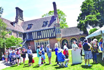  People line up for the “Antiques Roadshow” filming at Meadow Brook Hall June 14. 