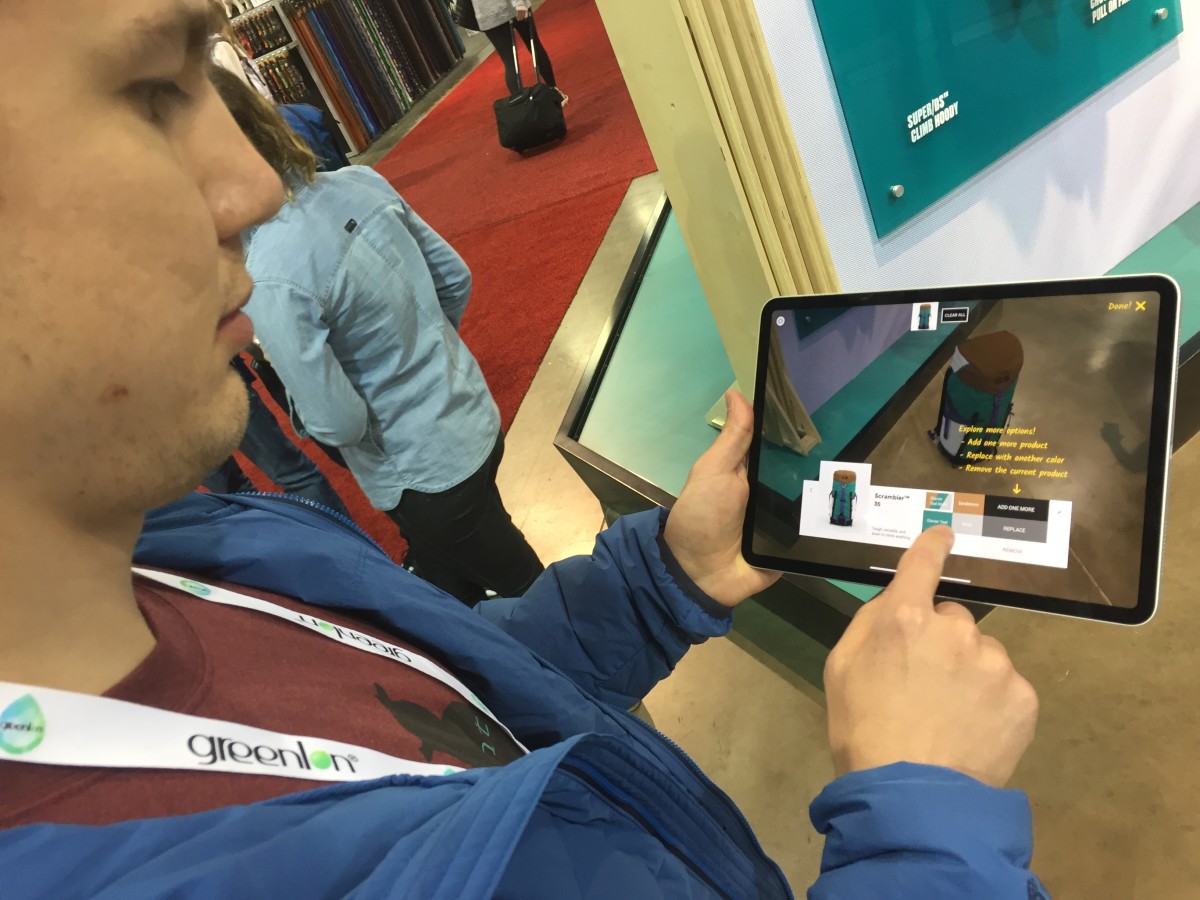 Denis Vasilev of Transparent House demonstrates the forthcoming augmented reality app.