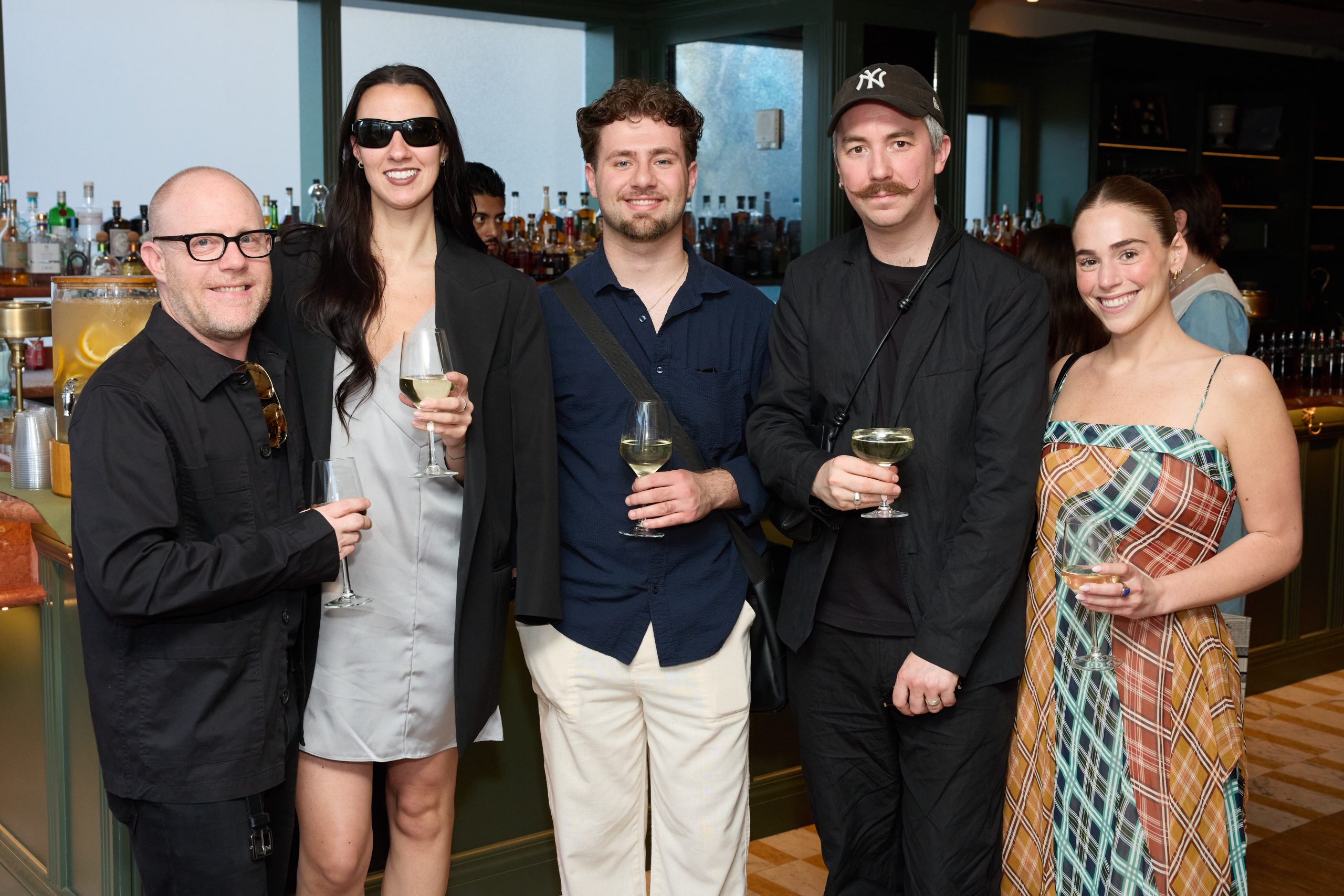 WindowsWear Summer Bash 2026 — Jason DeWerth, Director of Visual Merchandising, Outlet (Michael Kors) · Gavin Lourenco, Global Visual Merchandising Coordinator (Michael Kors) · Ryan Gonzalez, Global Communications & Graphics Coordinator (Michael Kors) · Tom Sykes, Director of Global Visual Experience (Michael Kors) · Nora Buchholtz, Production Manager, Global Visual Experience (Michael Kors)