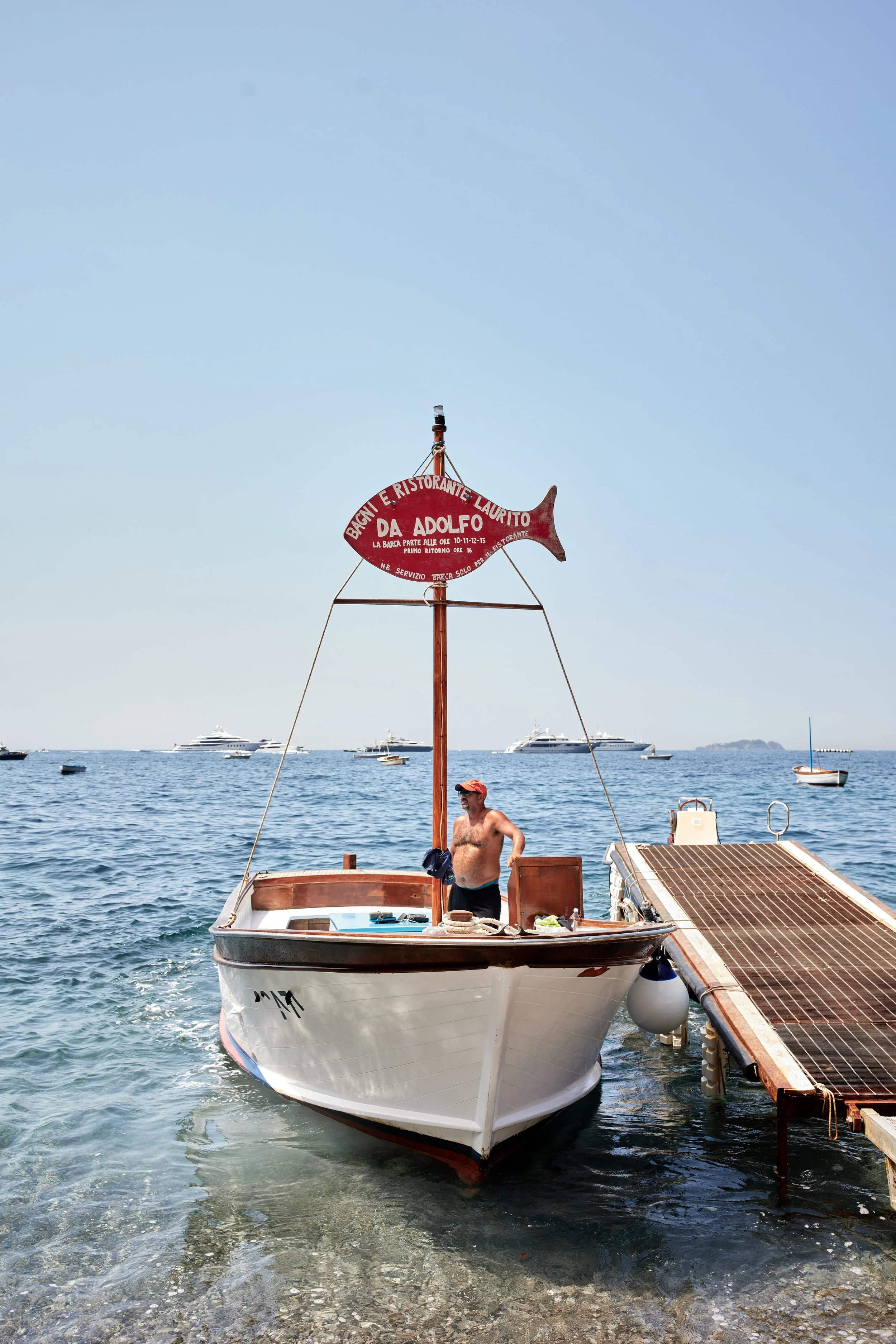 STAUD Da Adolfo dock sign